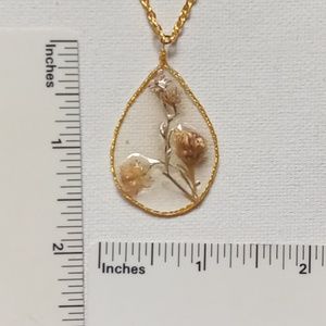 Floral necklace, amulet